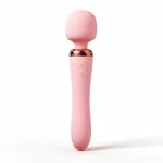 Pembe Ruya Luna blush pink wellness wand with rose-gold detail on an ivory background